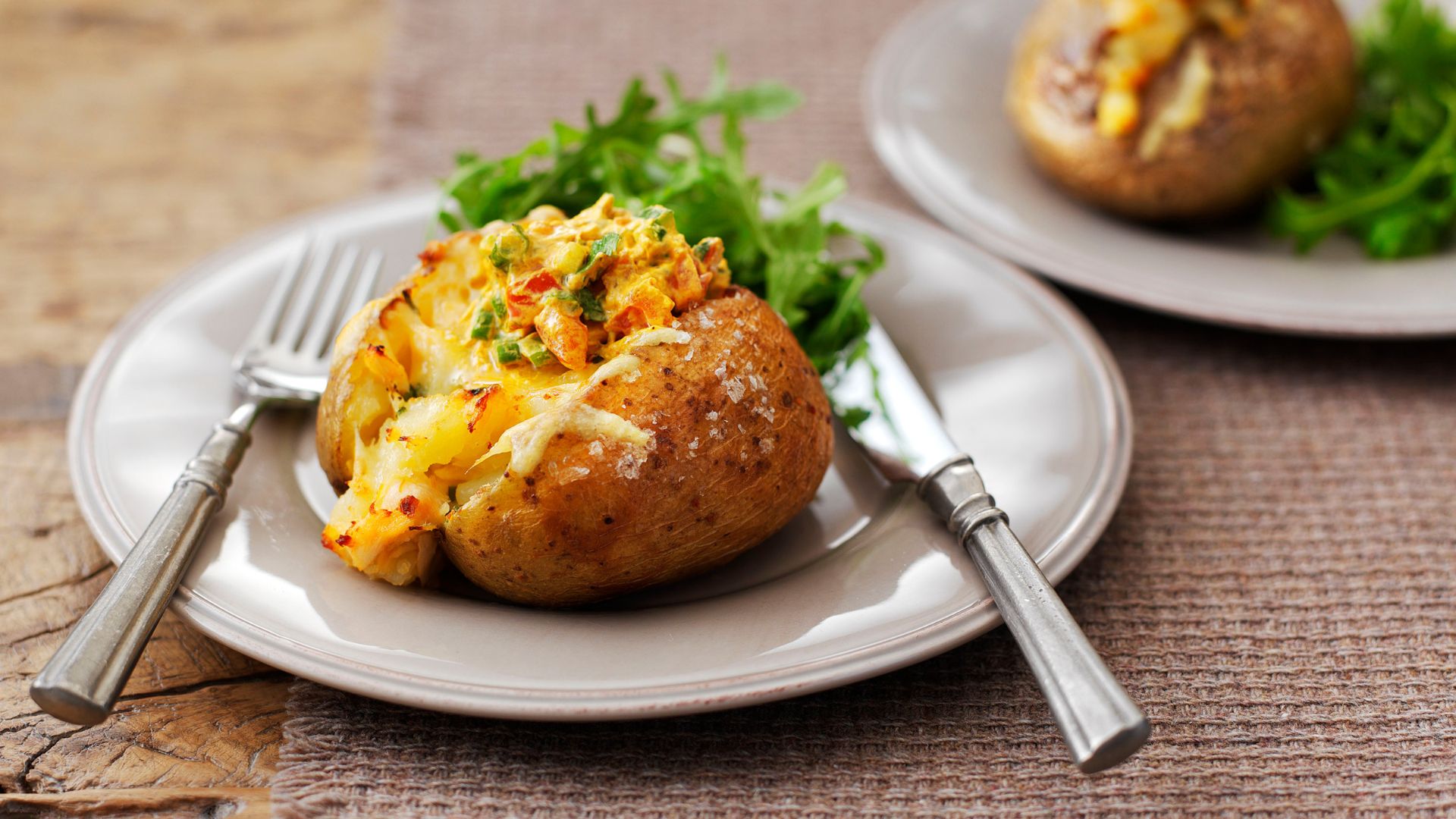 this image shows Baked Potatoes